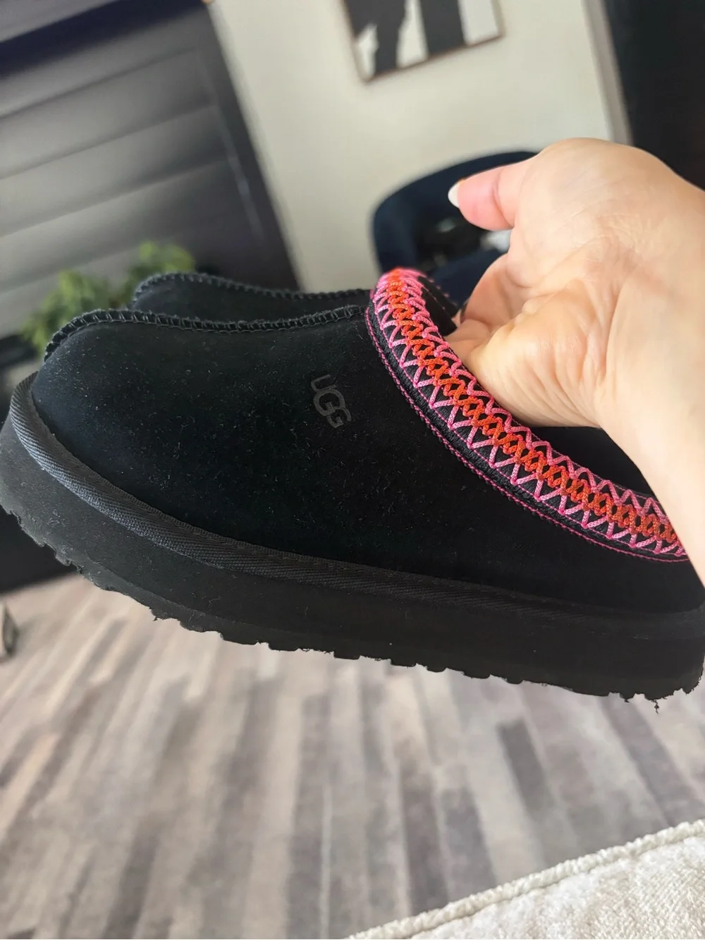 UGG Kids Black Slip-On Slippers with Pink and Orange Trim